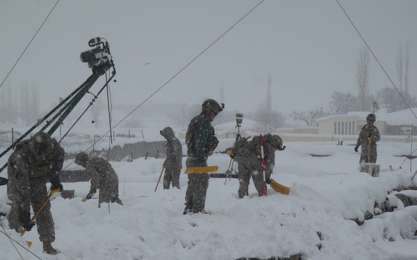Soldiers clearing snow