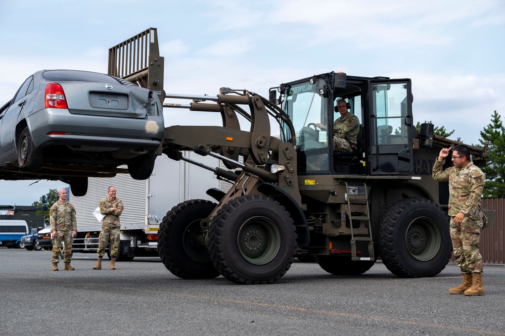 374 AW leadership attend 374 LRS vehicle rollover training