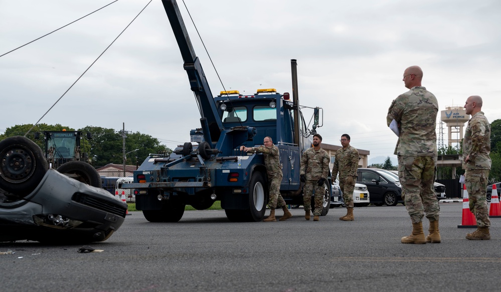 374 AW leadership attend 374 LRS vehicle rollover training