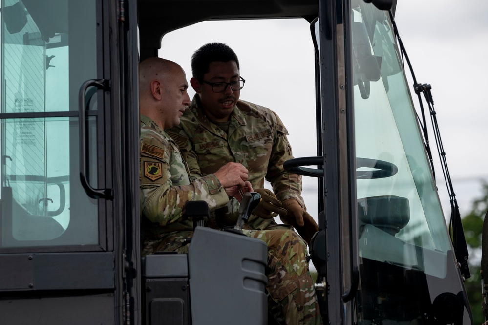 374 AW leadership attend 374 LRS vehicle rollover training