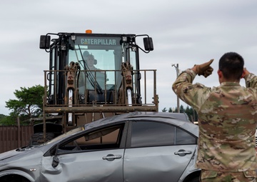 374 AW leadership attend 374 LRS vehicle rollover training