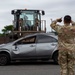 374 AW leadership attend 374 LRS vehicle rollover training