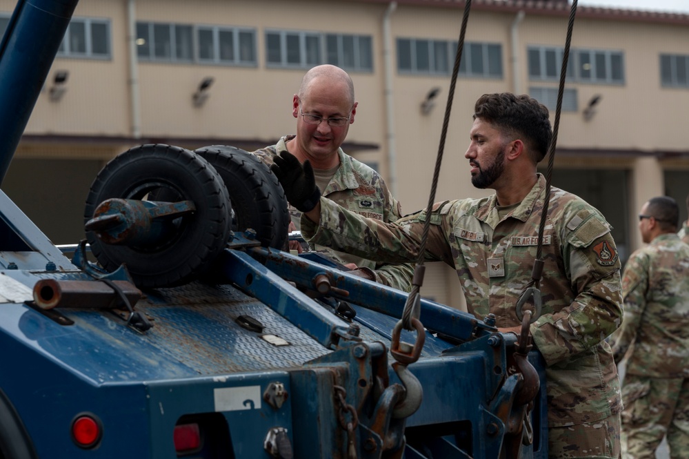 374 AW leadership attend 374 LRS vehicle rollover training