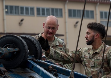 374 AW leadership attend 374 LRS vehicle rollover training