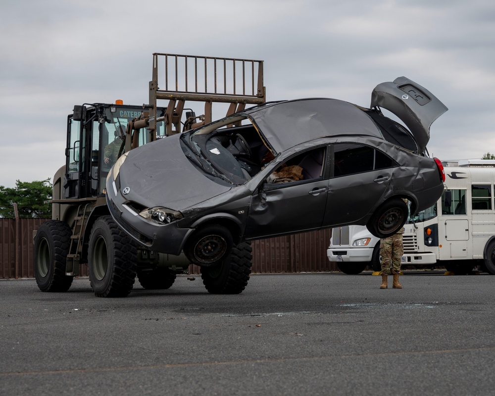 374 AW leadership attend 374 LRS vehicle rollover training