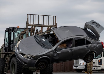 374 AW leadership attend 374 LRS vehicle rollover training