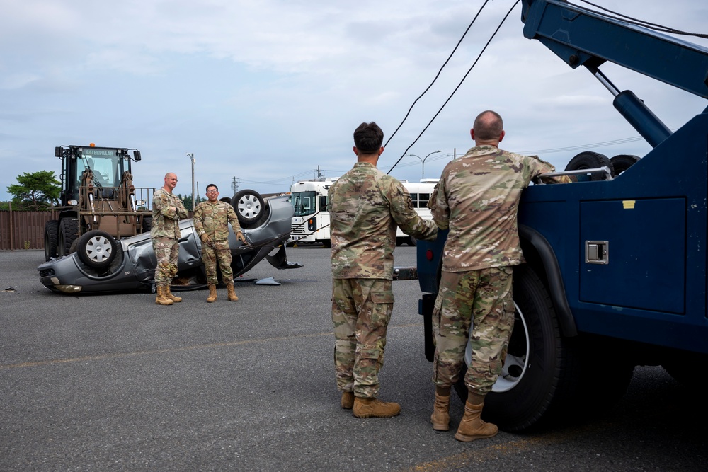 374 AW leadership attend 374 LRS vehicle rollover training