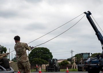 374 AW leadership attend 374 LRS vehicle rollover training
