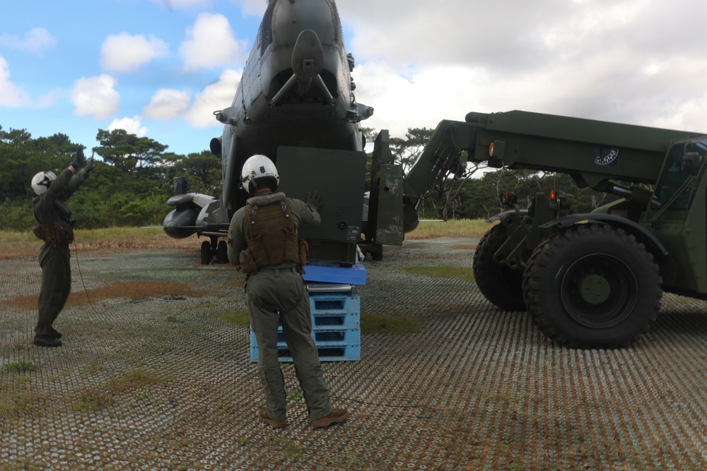 Marines with HMH-462, CLR-3, JGSDF members transport surface-to-surface missile on CH-53E Super Stallion