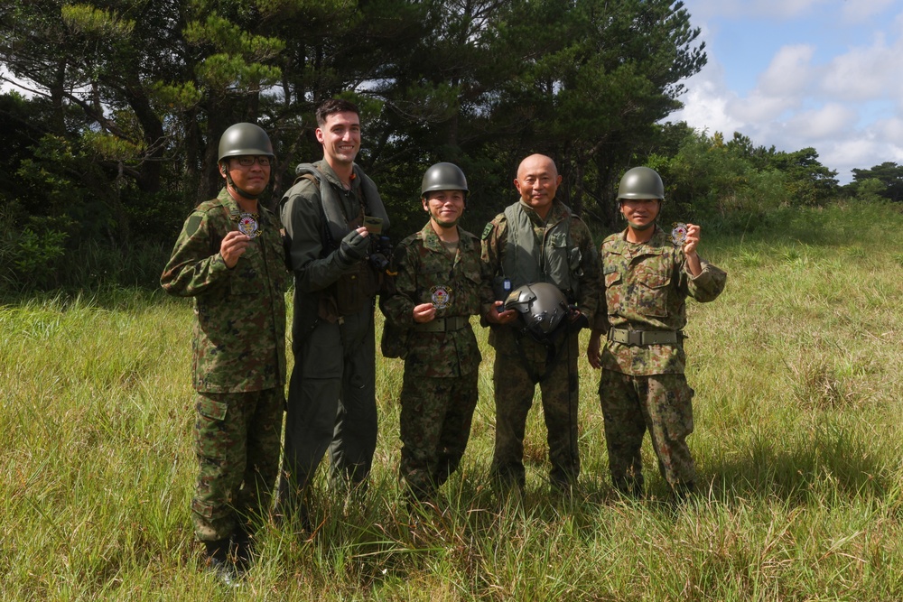 Marines with HMH-462, CLR-3, JGSDF members transport surface-to-surface missile on CH-53E Super Stallion