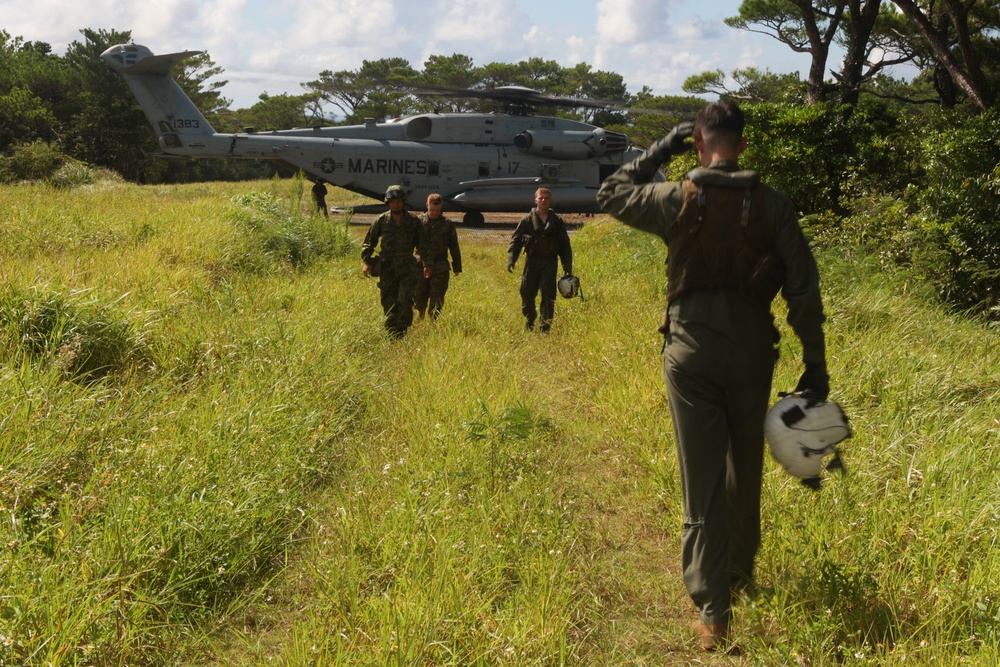 Marines with HMH-462, CLR-3, JGSDF members transport surface-to-surface missile on CH-53E Super Stallion