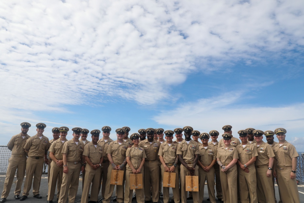 Sailors aboard the USS John Finn hold a chief petty officer pinning ceremony in the South China Sea