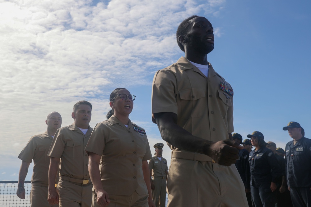 Sailors aboard the USS John Finn hold a chief petty officer pinning ceremony in the South China Sea