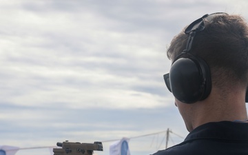 Sailors aboard the USS John Finn conduct a gun shoot in the South China Sea