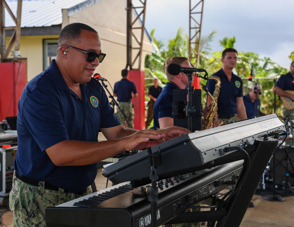 Pacific Partnership 2025 Multinational Band member Musician 2nd class Omar Machado Rios, performs for George B. Harris Elementary School students, in support of Pacific Partnership 2025, Sept. 24.