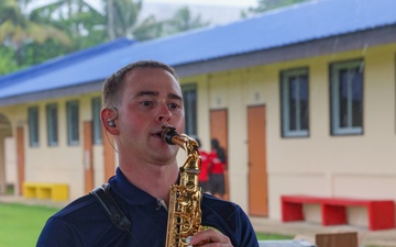 Pacific Partnership 2025 Multinational Band member, Musician 2nd class Aaron Plegue, performs for George B. Harris Elementary School students, in support of Pacific Partnership 2025, Sept. 24.