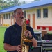 Pacific Partnership 2025 Multinational Band member, Musician 2nd class Aaron Plegue, performs for George B. Harris Elementary School students, in support of Pacific Partnership 2025, Sept. 24.