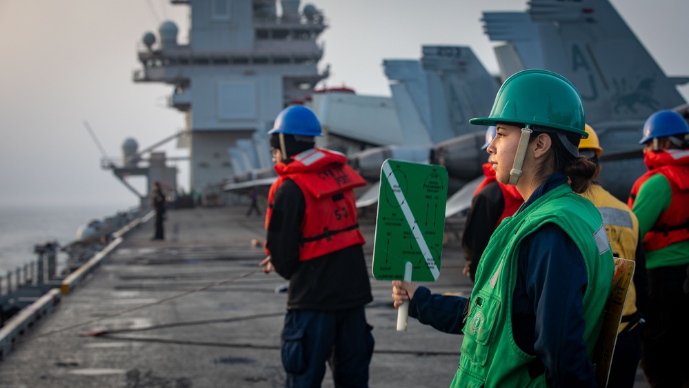 USS Gerald R. Ford (CVN 78) Sailor Signals During Replenishment-at-Sea