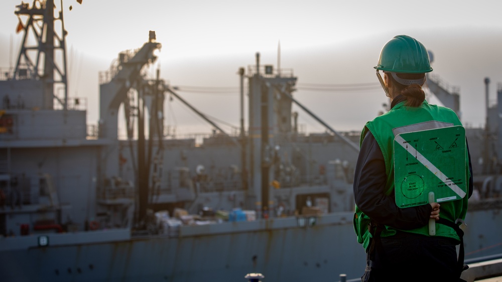 USS Gerald R. Ford (CVN 78) Sailor Signals During Replenishment-at-Sea
