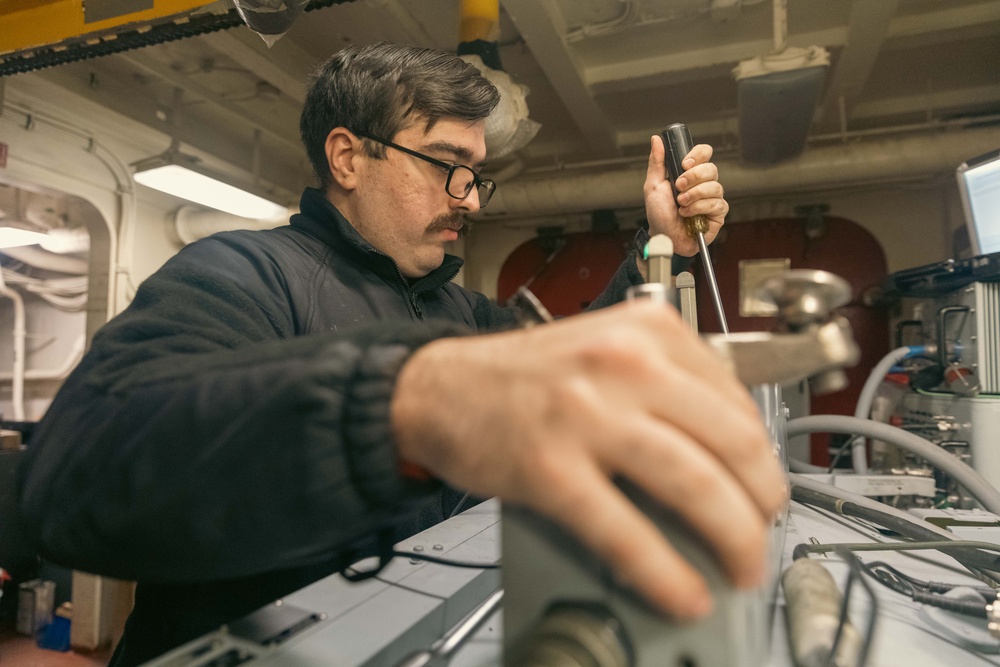 USS Gerald R. Ford (CVN 78) Sailor Conducts Maintenance