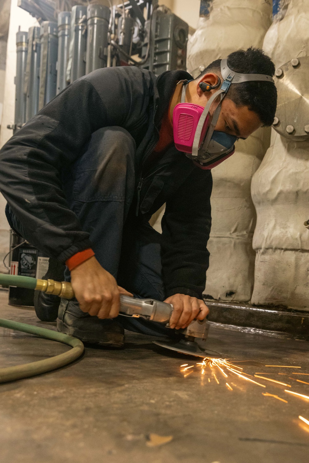 USS Gerald R. Ford (CVN 78) Sailor Conducts Maintenance