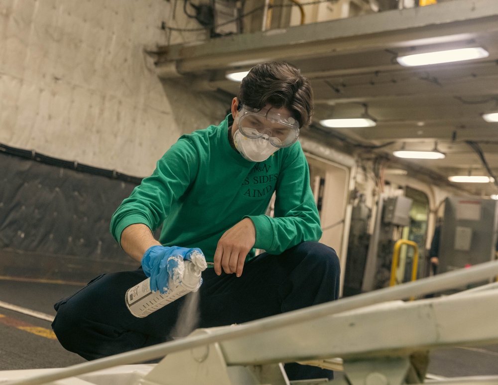 USS Gerald R. Ford (CVN 78) Sailor Conducts Maintenance