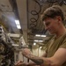 USS Gerald R. Ford (CVN 78) Sailor Conducts Jet Engine Maintenance