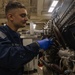 USS Gerald R. Ford (CVN 78) Sailor Conducts Jet Engine Maintenance