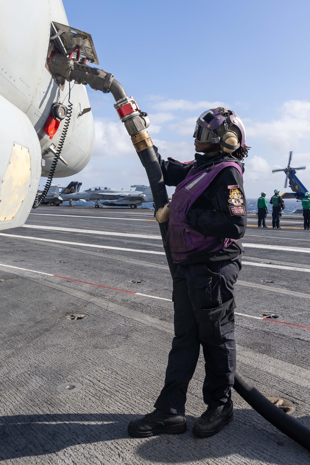 USS Gerald R. Ford (CVN 78) Sailor Fuels Aircraft