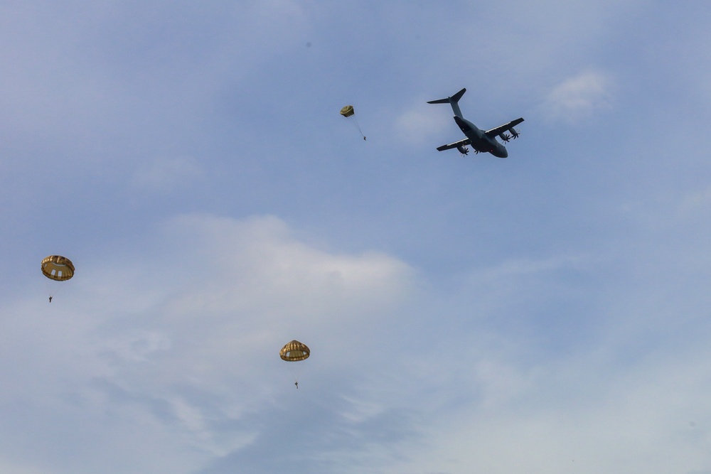 Allied Paratroopers Descend on Historic Drop Zone, Honoring Enduring Alliance