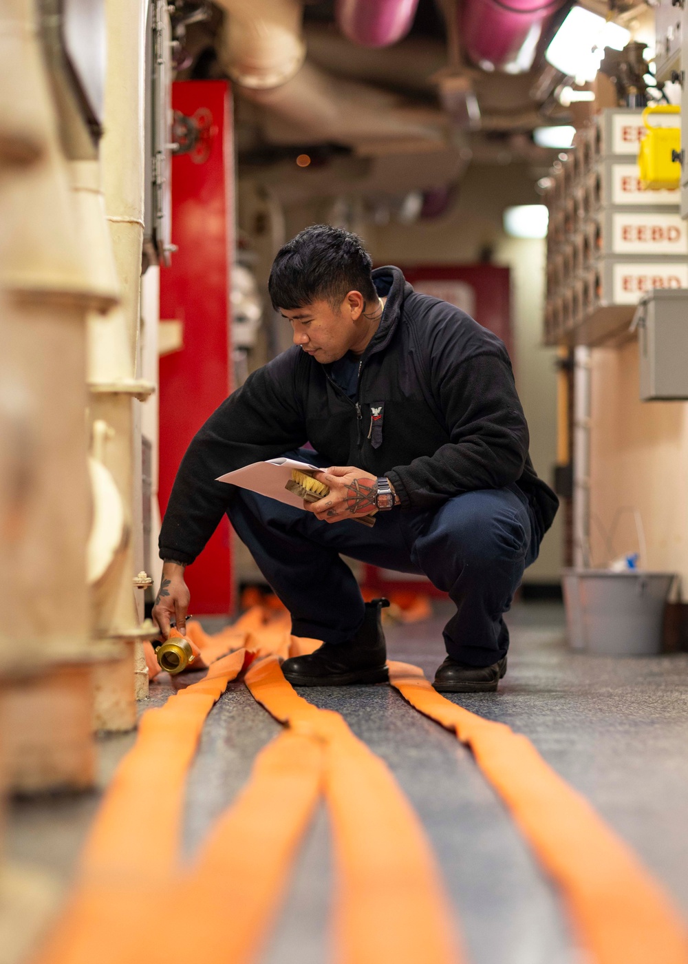 USS Gerald R. Ford (CVN 78) Sailor Conducts Maintenance