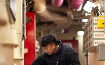 USS Gerald R. Ford (CVN 78) Sailor Conducts Maintenance