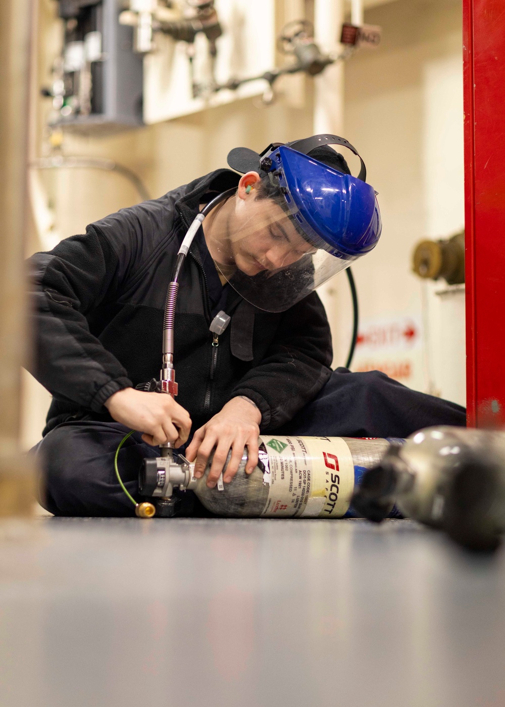 USS Gerald R. Ford (CVN 78) Sailor Conducts Maintenance
