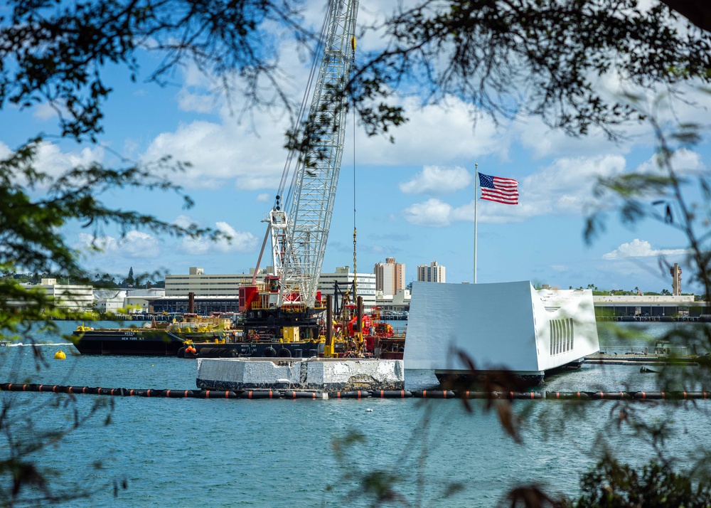 U.S. Navy repositions crane barge near USS Arizona platform 2.