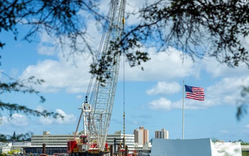 U.S. Navy repositions crane barge near USS Arizona platform 2.