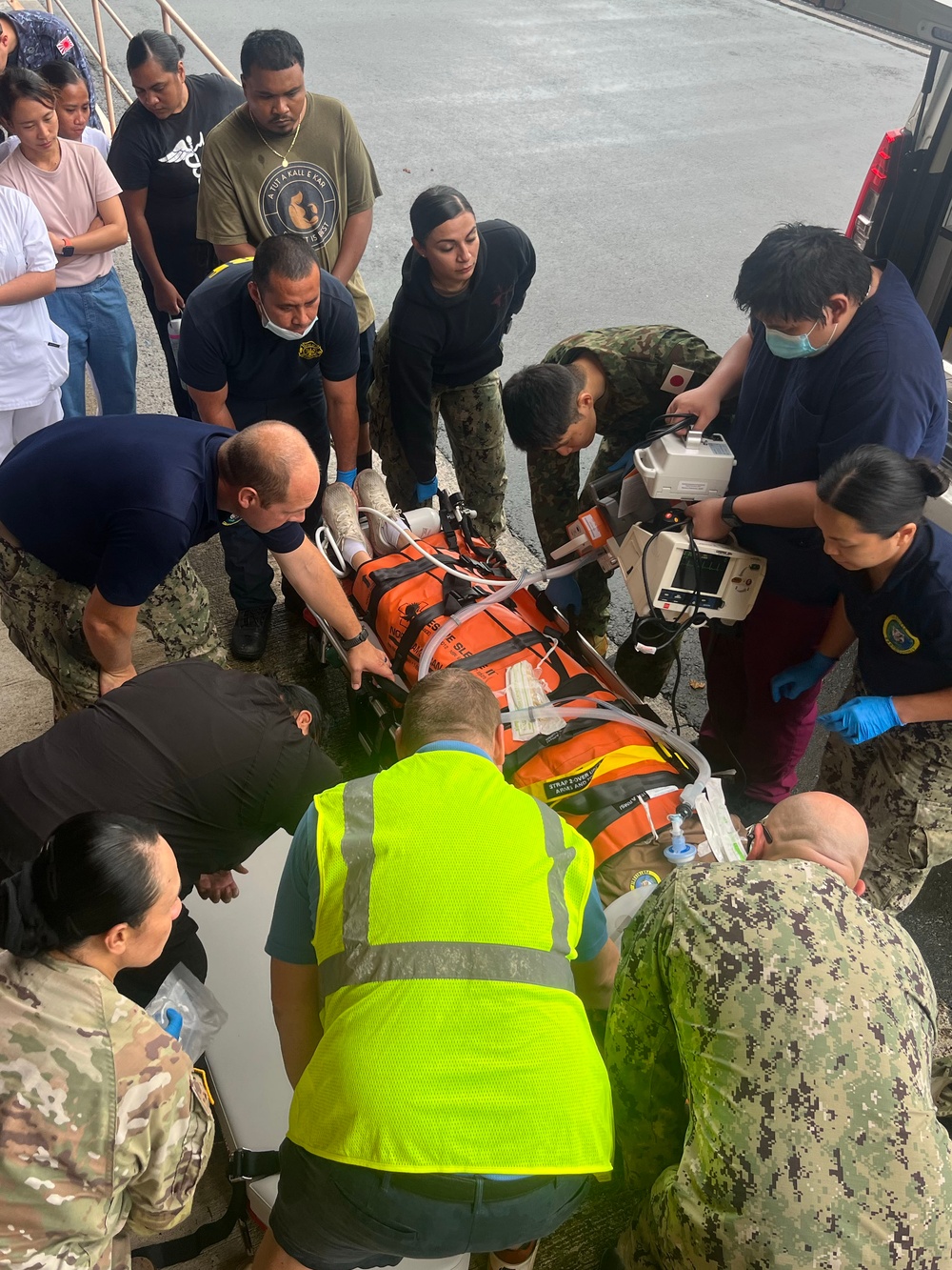 Multinational medical professionals and Palaun medical professionals participate in a simulated trauma training and air evacuation exercise, Sept. 23