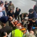 Multinational medical professionals and Palaun medical professionals participate in a simulated trauma training and air evacuation exercise, Sept. 23