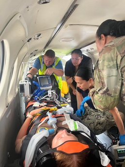 Multinational medical professionals and Palaun medical professionals participate in a simulated trauma training and air evacuation exercise, Sept. 23