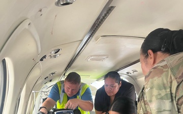Multinational medical professionals and Palaun medical professionals participate in a simulated trauma training and air evacuation exercise, Sept. 23