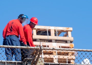 USS America Conducts an Ordnance Handling Evolution at Naval Weapons Station Seal Beach.