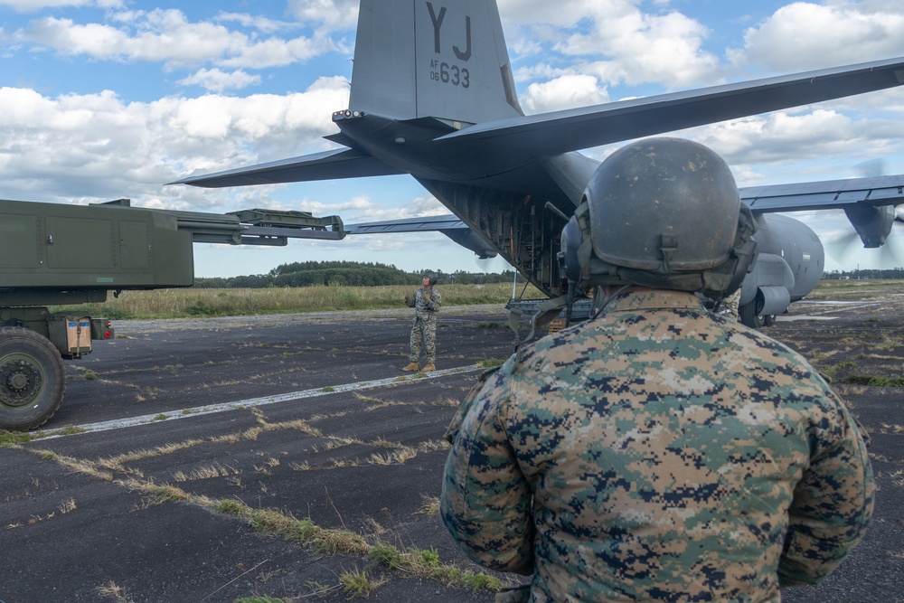 U.S. Marines and Airmen Transport HIMARS During Orient Shield 25