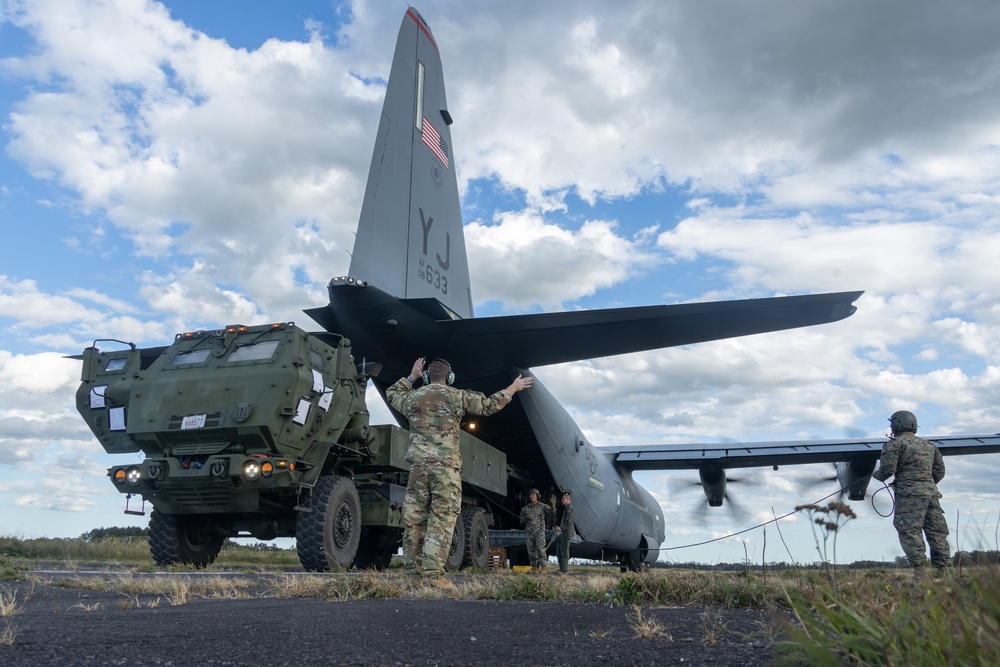 U.S. Marines and Airmen Transport HIMARS During Orient Shield 25