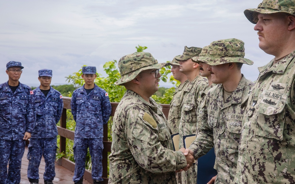Pacific Partnership 2025 multinational service members attend a Seabee Combat Warfare pinning ceremony on Bloody Nose Ridge in Peleliu, Palau