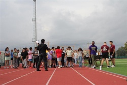 173rd Airborne Brigade Paratroopers Pace Students During Wellness Day Run at Vicenza Middle School [Image 1 of 4]