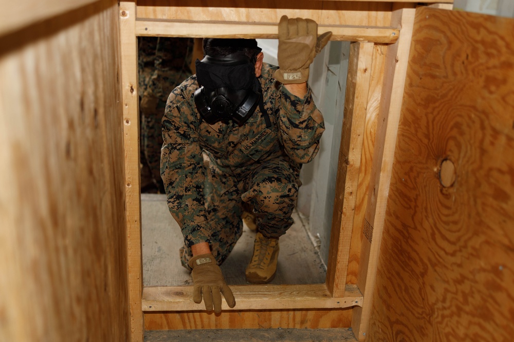 U.S. Member Security Guard Students Train in Confined Space Trainer and Gas Chamber