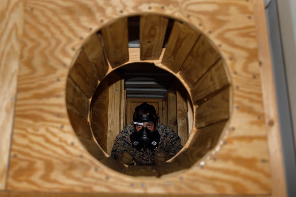 U.S. Member Security Guard Students Train in Confined Space Trainer and Gas Chamber