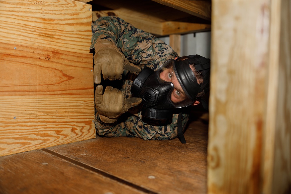 U.S. Member Security Guard Students Train in Confined Space Trainer and Gas Chamber