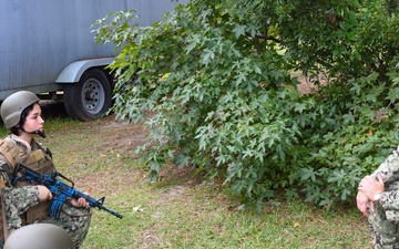 Hospital Corpsmen do tactical combat casualty care drill