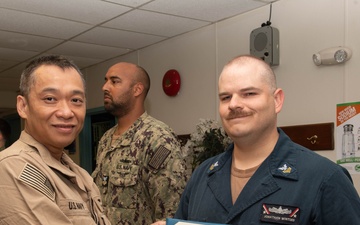 USS John C. Sennis Supply Awards at Quarters