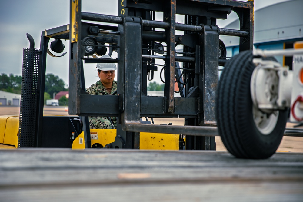 Sailors at VX-1 unload equipment